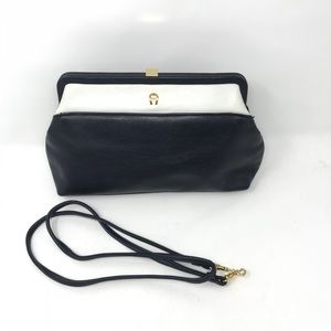 navy blue and white clutch bag